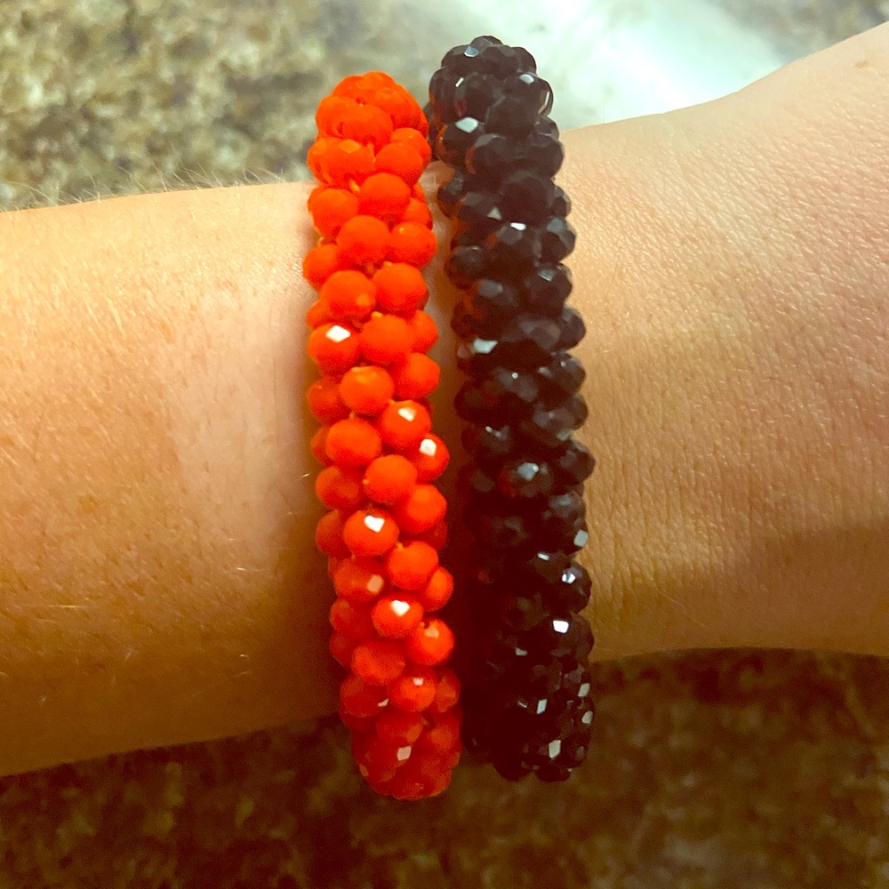 Orange and black beaded bracelets